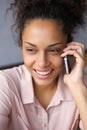 Smiling black woman talking on cell phone Royalty Free Stock Photo