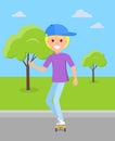 Smiling Blond Boy Ride on Skateboard at Skatepark Royalty Free Stock Photo