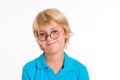 Smiling blond boy with round glasses Royalty Free Stock Photo