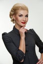 Smiling blond woman with a retro make-up Royalty Free Stock Photo