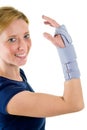 Smiling Blond Woman Wearing Supportive Wrist Brace Royalty Free Stock Photo