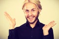 Smiling blonde man with piercing Royalty Free Stock Photo