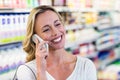 Smiling blonde woman having a call phone Royalty Free Stock Photo