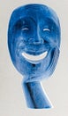 Smiling Blue Wooden Negative Style Face