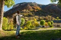 Smiling boy with backpack in autumn mountains Royalty Free Stock Photo