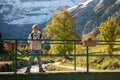 Smiling boy with backpack in autumn mountains Royalty Free Stock Photo