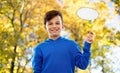 Smiling boy in blue hoodie with speech bubble
