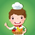 A smiling boy chef holding a basket of vegetables