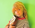 Smiling boy with chessboard