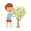 Smiling Boy Drawing Tree with Felt Pen on the Wall Vector Illustration Royalty Free Stock Photo