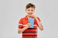 Smiling boy eating popcorn Royalty Free Stock Photo