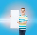 Smiling boy in eyeglasses with white blank board Royalty Free Stock Photo
