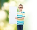 Smiling boy in eyeglasses with white blank board Royalty Free Stock Photo