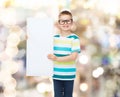 Smiling boy in eyeglasses with white blank board Royalty Free Stock Photo