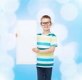 Smiling boy in eyeglasses with white blank board Royalty Free Stock Photo