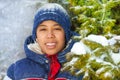 Smiling boy in the forest with snow flakes Royalty Free Stock Photo