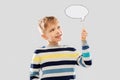 Smiling boy holding blank speech bubble Royalty Free Stock Photo