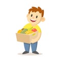 Smiling boy holding a box full of fruits and veggies, cartoon character design. Flat vector illustration, isolated on Royalty Free Stock Photo
