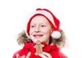 Smiling boy holding gingerbread man. Royalty Free Stock Photo