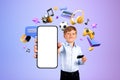 Smiling boy holding mockup smartphone, online shopping and video games Royalty Free Stock Photo