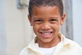 Smiling boy home from school