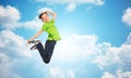 Smiling boy jumping in air Royalty Free Stock Photo