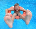 Smiling boy on lifebuoys Royalty Free Stock Photo