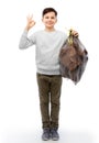 smiling boy with paper garbage in plastic bag