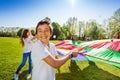 Smiling boy playing active game with friends Royalty Free Stock Photo