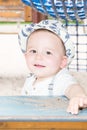 boy playing on wood hute at playground