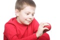 Smiling boy with red apple Royalty Free Stock Photo