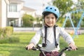 Smiling boy in safety helmet riding his bike. Royalty Free Stock Photo