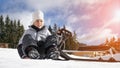 Smiling boy on snowy slope of ski mountain resort. Active winter holiday, Christmas family vacation concept. Copy space Royalty Free Stock Photo