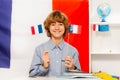 Smiling boy studying French at the class Royalty Free Stock Photo