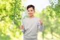 smiling boy with toy wind turbine Royalty Free Stock Photo