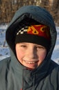 Smiling boy in winter clothes Royalty Free Stock Photo