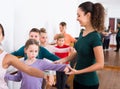 smiling boys and girls rehearsing ballet dance in studio Royalty Free Stock Photo