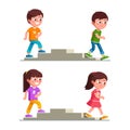 Smiling boys and girls walking up and down stairs Royalty Free Stock Photo