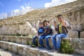 Smiling boys in the Roman Theater of Jerash in Jordan Royalty Free Stock Photo