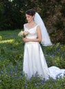 Smiling bride in bluebonnet field