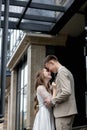 Smiling bride and groom, romantic embracing at their wedding day