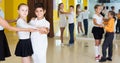 Children dancing pair dance in class