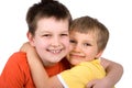 Smiling brothers hugging Royalty Free Stock Photo