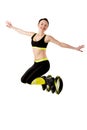 Smiling brunette girl jumping in a kangoo jumps shoes. Royalty Free Stock Photo