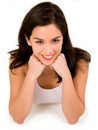 Smiling Brunette on her Elbows Royalty Free Stock Photo