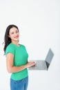 Smiling brunette using laptop Royalty Free Stock Photo