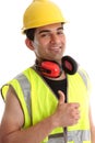 Smiling builder thumbs up