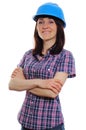 Smiling builder woman wearing protective blue helmet