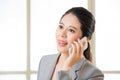 Smiling Business asian Woman talking on a Mobile phone Royalty Free Stock Photo