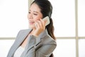 Smiling Business asian Woman talking on a Mobile phone Royalty Free Stock Photo